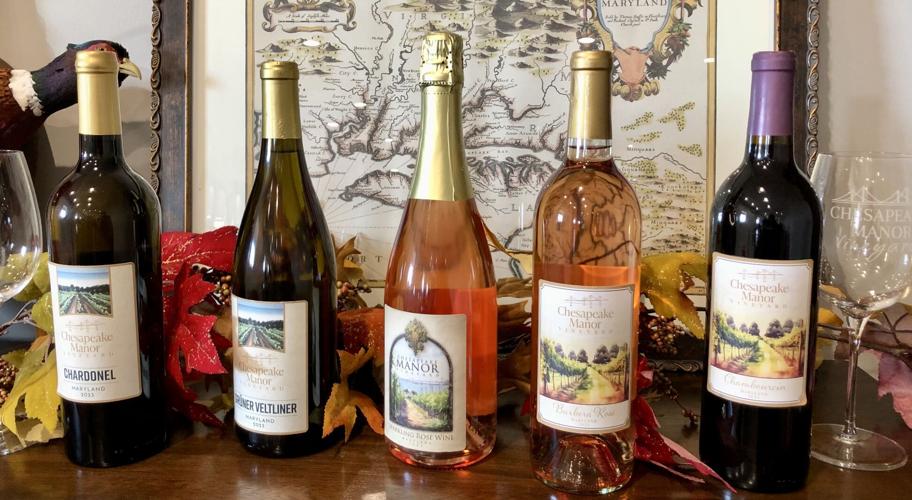 Opening a bottle of wine from Chesapeake Manor Vineyard on Kent Island.